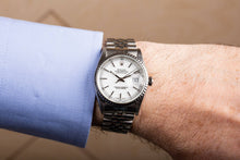 man wearing Rolex Datejust on wrist